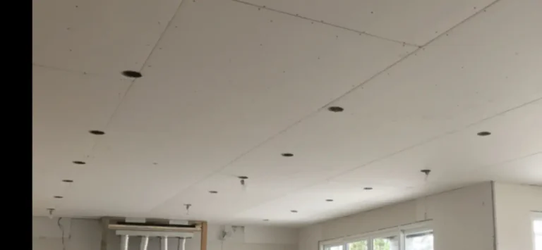 Drywall Hung into Ceiling around Recessed Lights and Sprinkler System